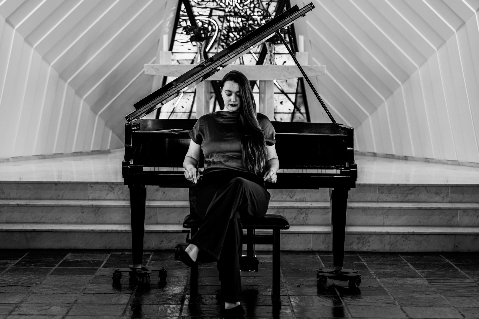 Heather Pinkham performing at the piano